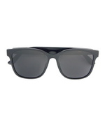 Load image into Gallery viewer, Black sunglasses with dark lenses on a white background
