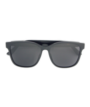 Black sunglasses with dark lenses on a white background