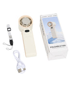 Load image into Gallery viewer, Complete foldable fan package showing cream cooling fan, retail box, wrist strap, and USB-C charging cable
