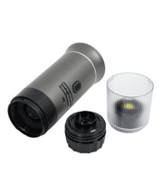 Gray 3-in-1 portable espresso maker fully disassembled showing main unit, black brewing components, transparent collection cup, and all detachable parts