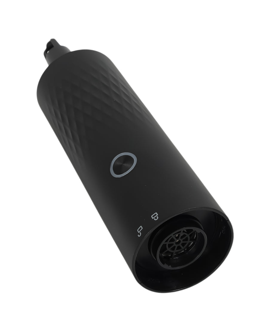 Handheld HEPA vacuum cleaner showing suction inlet opening and power button with transparent dustbin chamber
