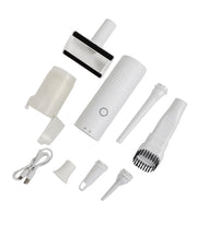 Set of white cleaning tools, including a brush, squeegee, and various nozzles of a vacuum cleaner on a white background.