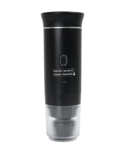 Black 3-in-1 portable espresso maker top view showing yellow heating plate and power button with usage instructions