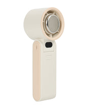Cream Ice Touch cooling fan in open position showing fan blades, USB-C charging port, and extended grip handle