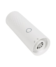 White cylindrical vacuum cleaner with a power symbol on a white background