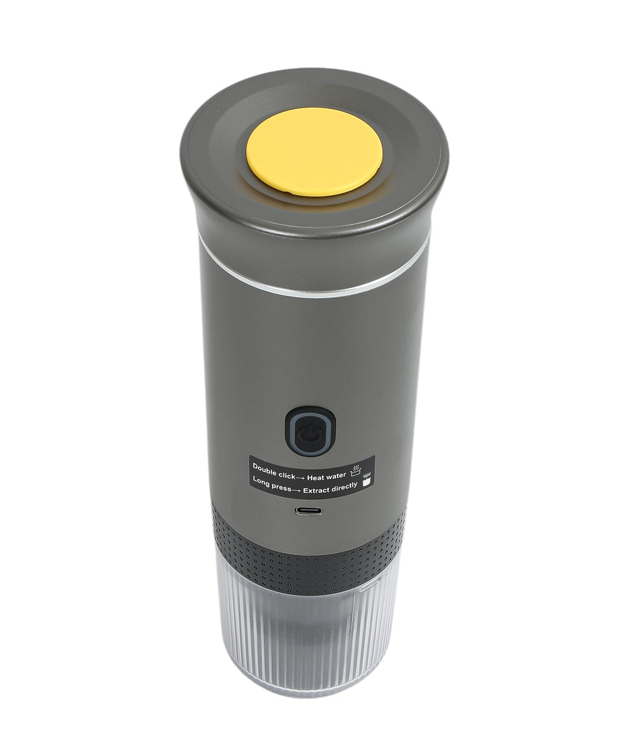 Gray 3-in-1 portable espresso maker top view showing yellow heating plate, power button, and usage instructions with transparent collection base