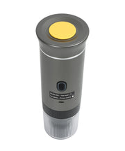Gray 3-in-1 portable espresso maker top view showing yellow heating plate, power button, and usage instructions with transparent collection base